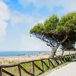 Beachfront Flat With Terrace Бибионе